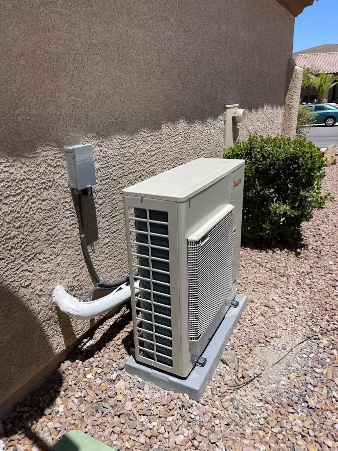 Residential air conditioning condenser unit in College